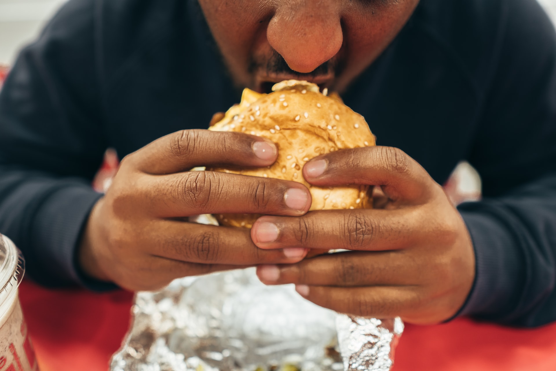 Person eating a burger